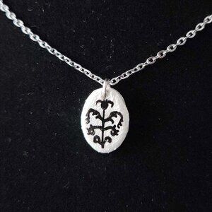 Iridescent Victorian Goth necklace with a small silver chain